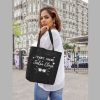 Female Holding unisex salsa class tote bag - flauntpassion