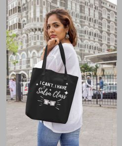 Female Holding unisex salsa class tote bag - flauntpassion